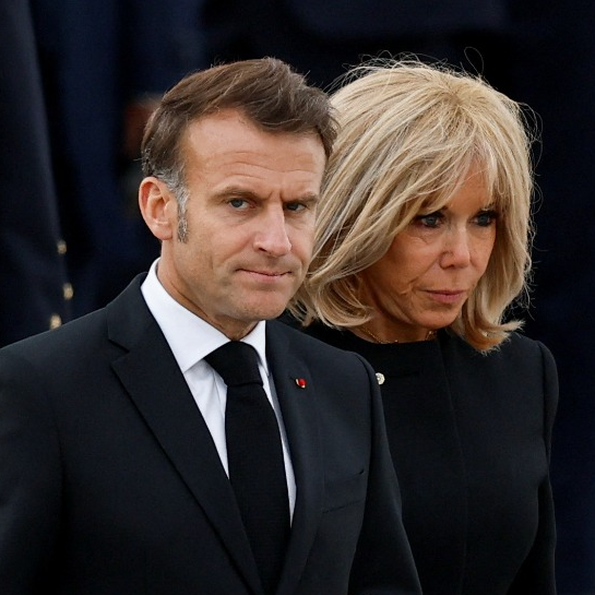 Shocking moment Macron 'is shoved in the face' by wife Brigitte as they touch down in Vietnam | Daily Mail Online
