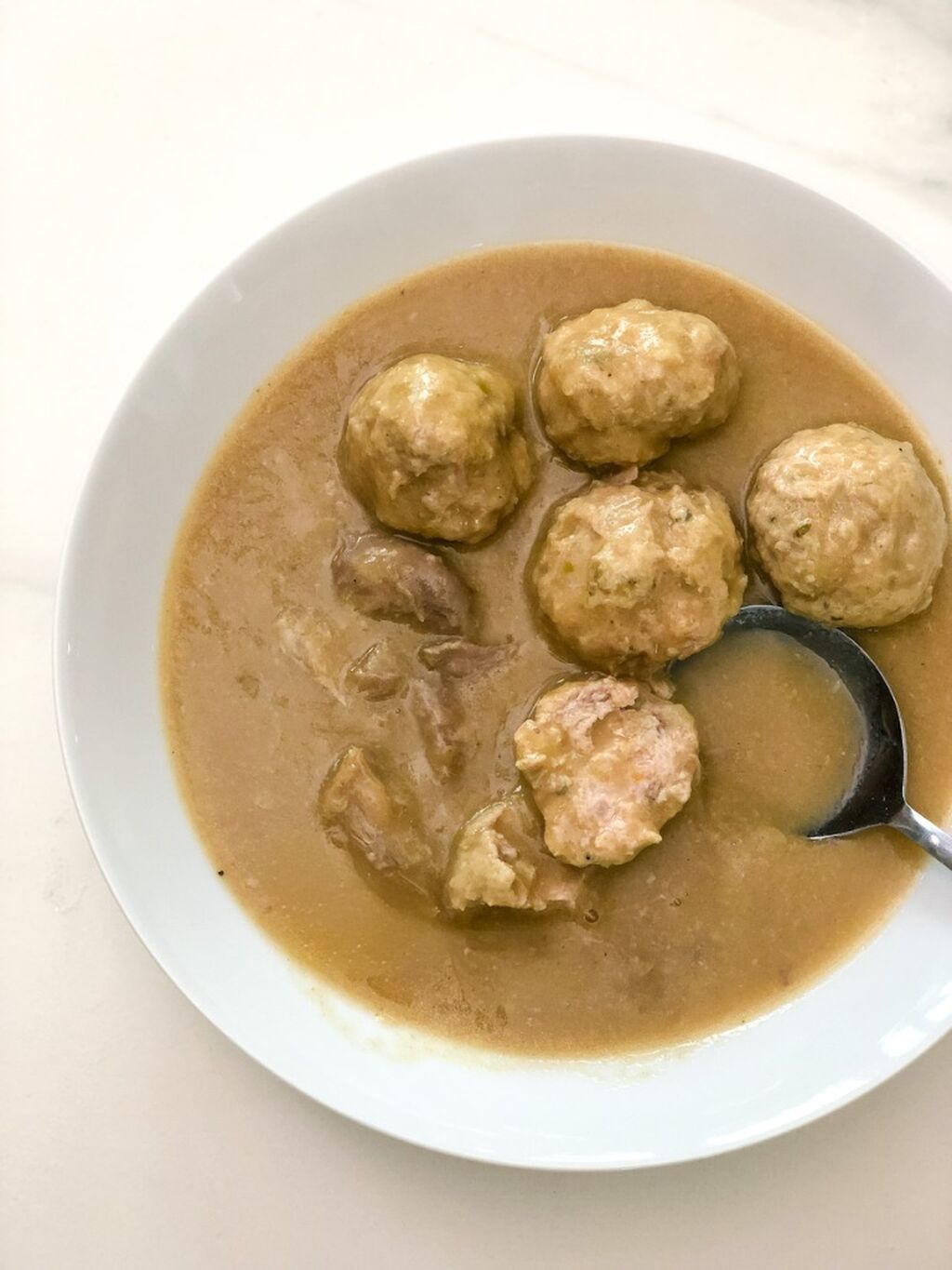 Rago&ucirc;t de boulettes et pattes de porc