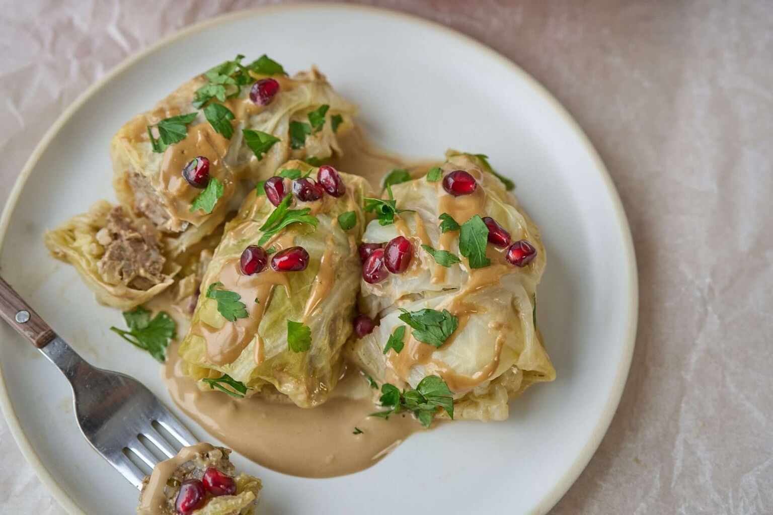 Cumin&ndash;Spiced Lamb Cabbage Rolls with Tahini & Pomegranate&nbsp;
