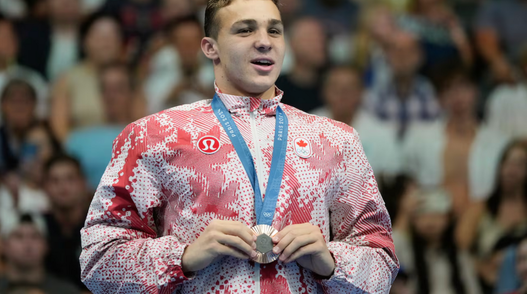 Canadian swim star Ilya Kharun, who won 2 bronze medals at Paris Olympics, says he'll now compete for U.S.