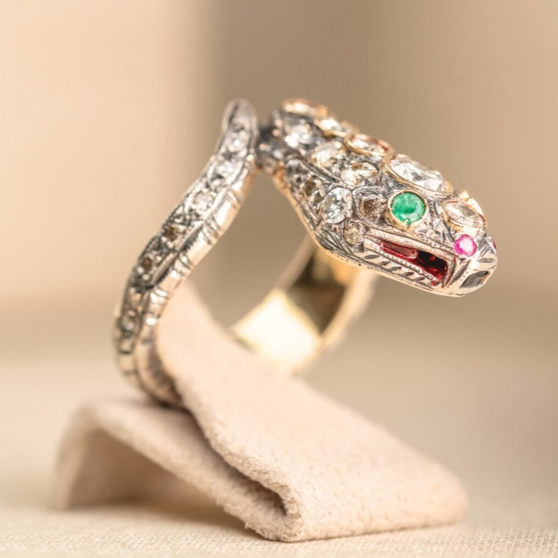 Snake Ring in Gold and Silver with Diamonds, Rubies and Emeralds