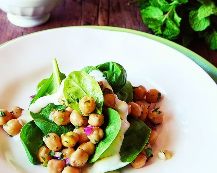 Chickpea and Spinach Salad with Cumin Dressing and Yogurt Drizzle