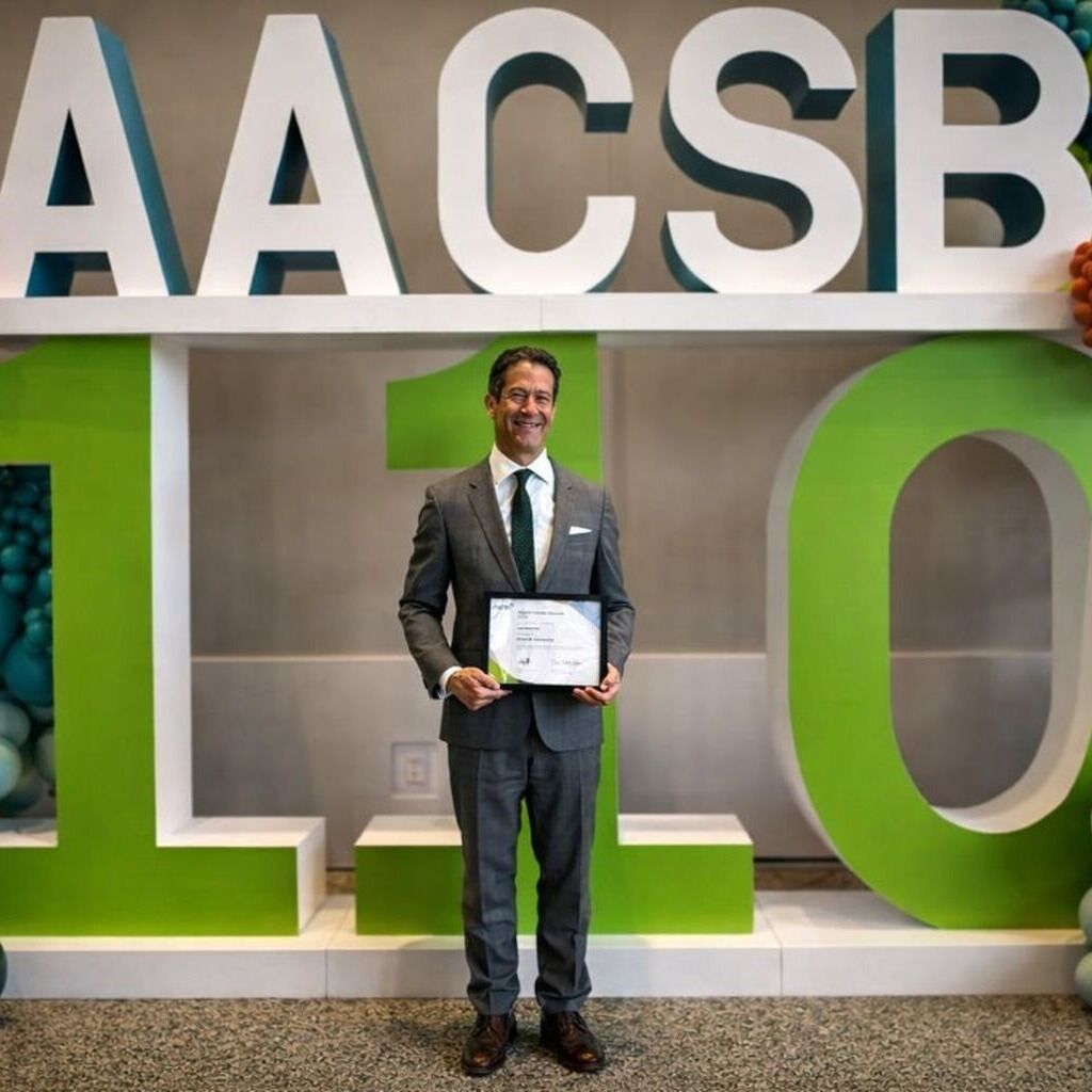 Dean Lee Newman x AACSB Global Impact Awards Winner