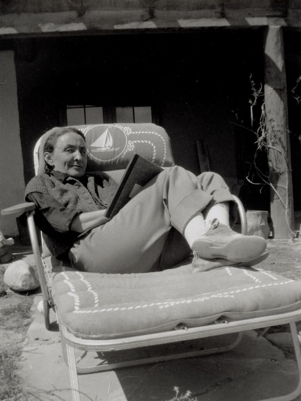 Georgia O'Keeffe Writing Daily Letter to Alfred Stieglitz, Ghost Ranch House Patio. 1944. 