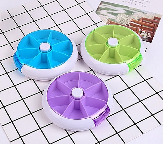 Rotating 7-Day Pill Organizer One-Button Weekly Box
