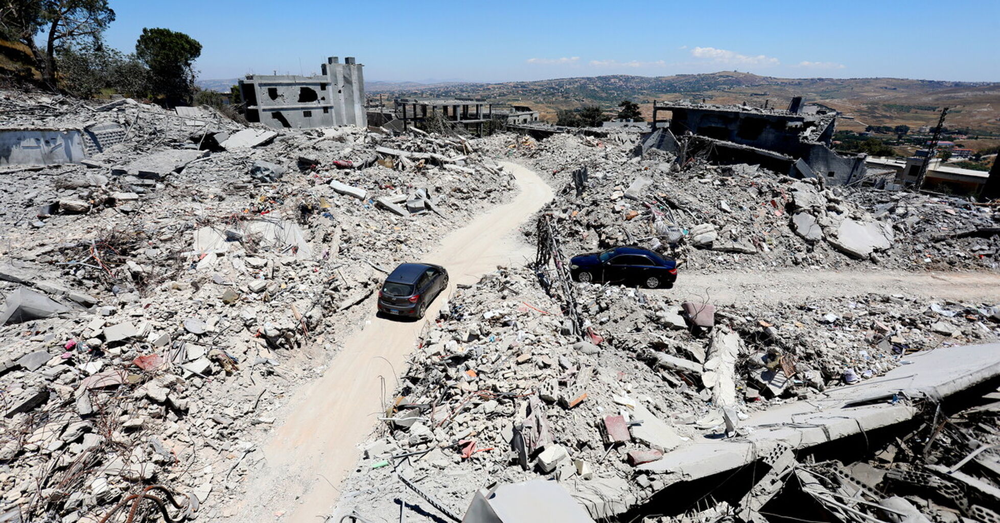 In Photos: Displaced Families Return to Devastated Neighborhoods