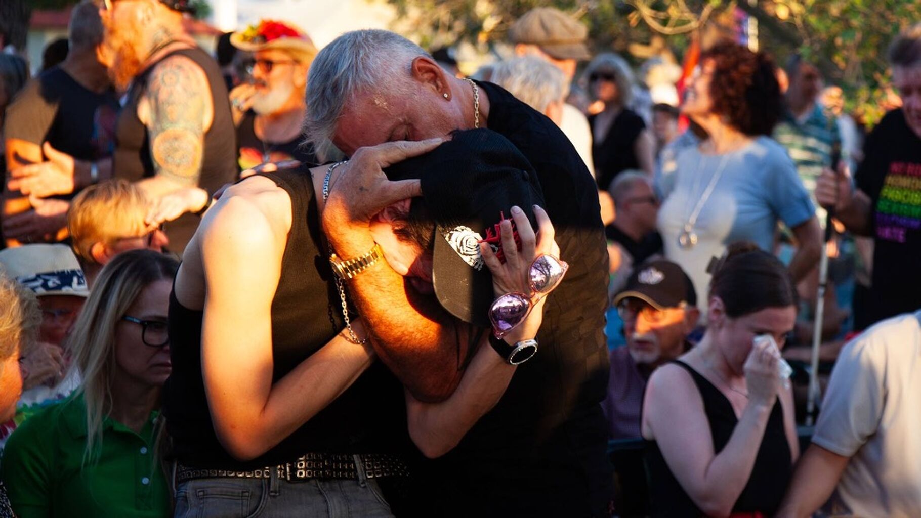'No gun gets to define my brother': Tucsonans hold a candlelight vigil for hate-crime victims
