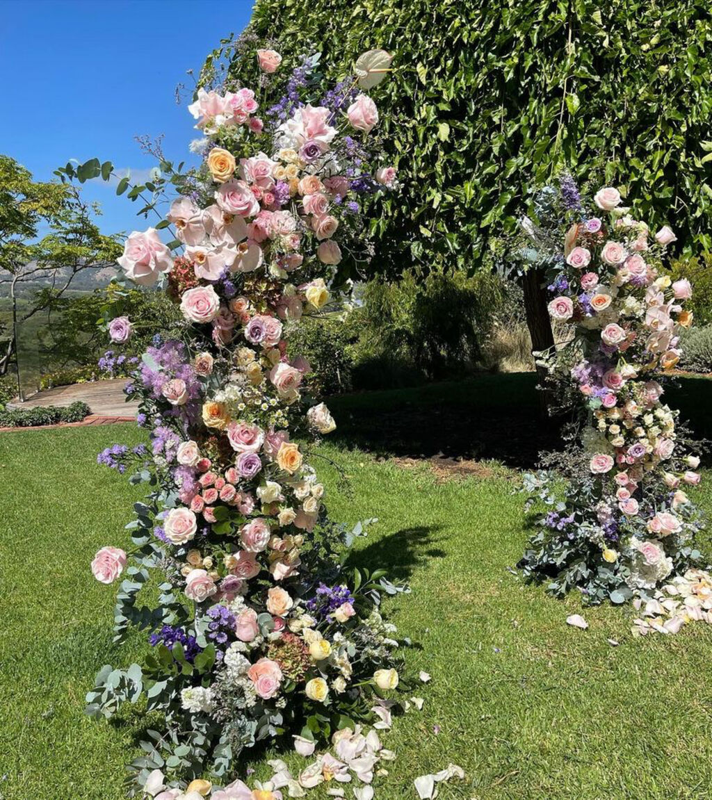 Soft pastel floral arches at Tipsy Hill Estate