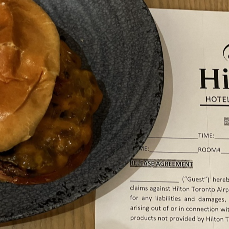 Cheeseburger served with waiver at Toronto restaurant