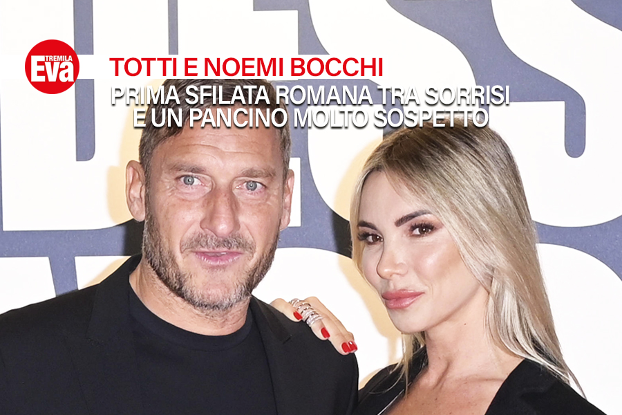 Noemi Bocchi sfila per la prima volta sul red carpet di Roma con Francesco Totti e mette in mostra un pancino sospetto - EvaTremila