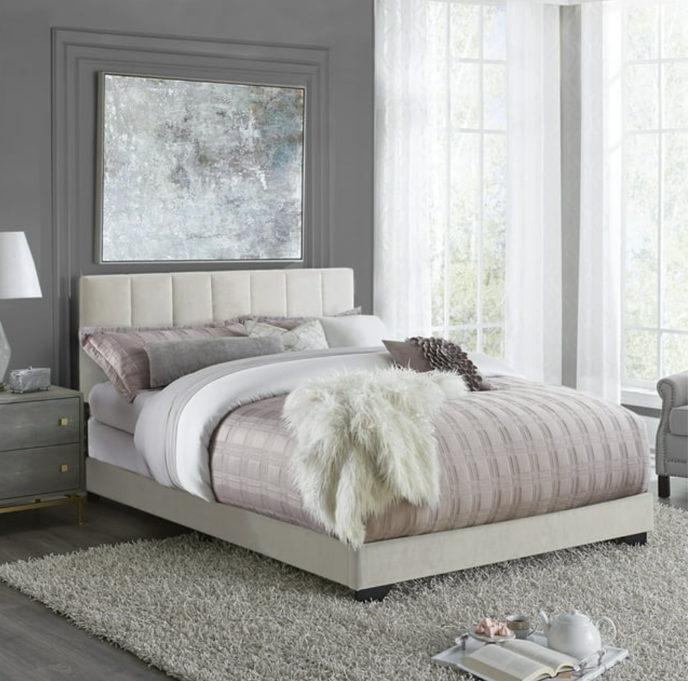 Queen upholstered bed $105