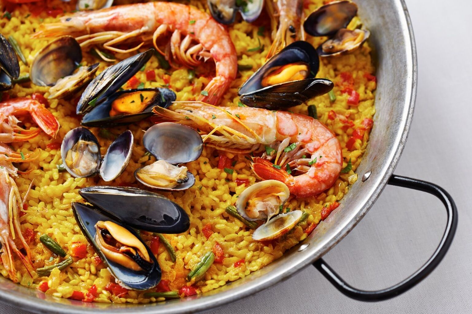 Paella: Origins, Variations, Wine Pairings, and Recipe