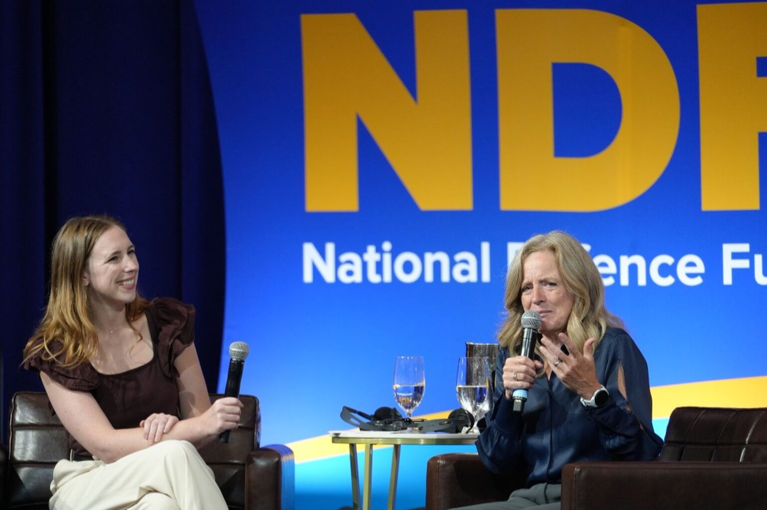 Jen Hassum chats with Rachel Notley at UFCW Canada National Defence Fund Convention