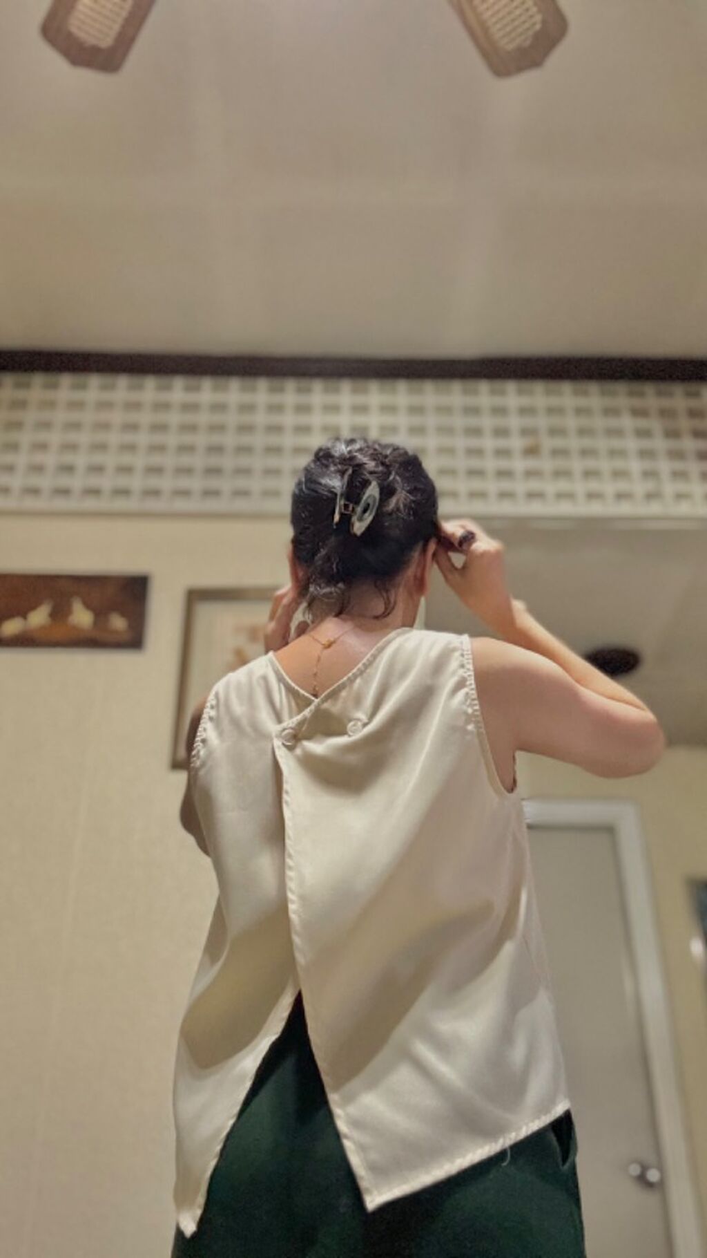 Sleeveless button back top