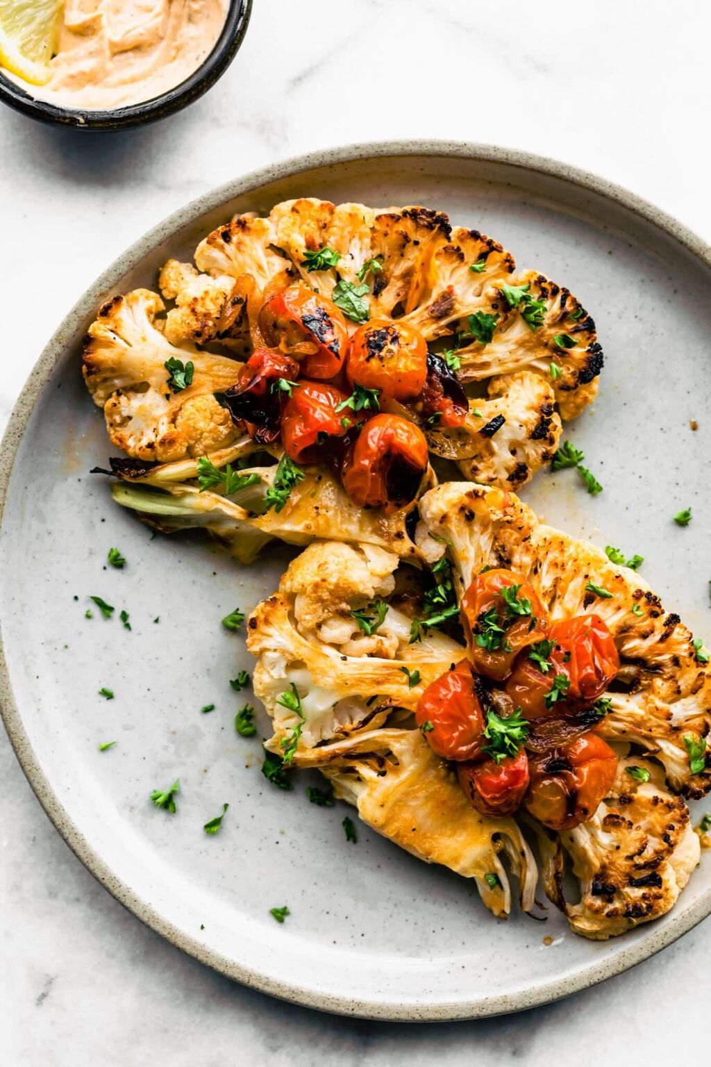 Roasted Cauliflower Steaks with Paprika Cashew Cream Sauce 