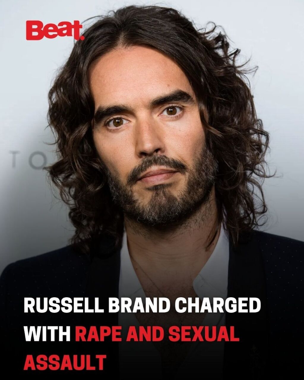 Russell Brand charged with rape and sexual assault