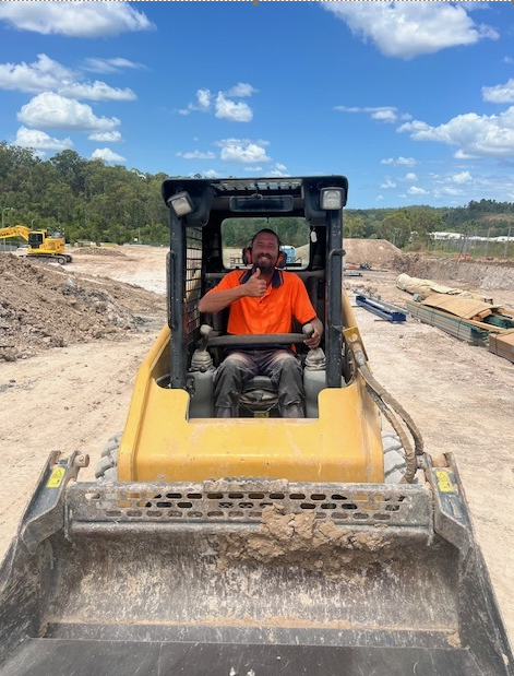 Damien is now working in construction!